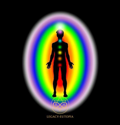 Meditating human figure with glowing aligned chakras on a black background